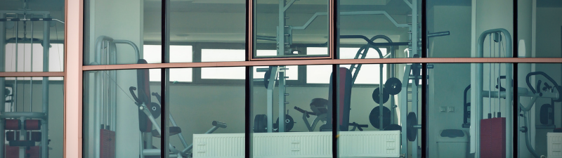 nexo_gym equipment through windows