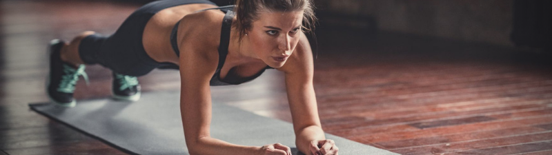 nexo_woman doing planks